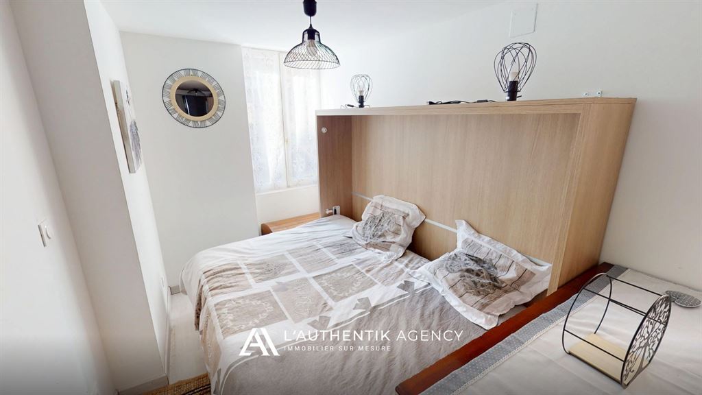 photographie du coin nuit avec son lit double